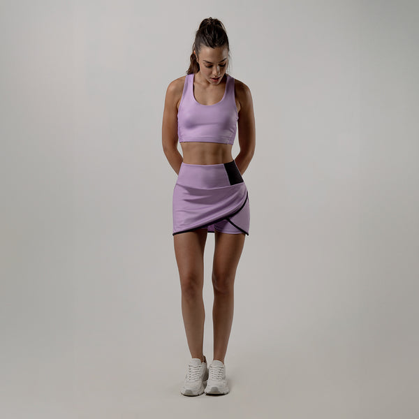 conjunto deportivo para dama en falda con top violeta